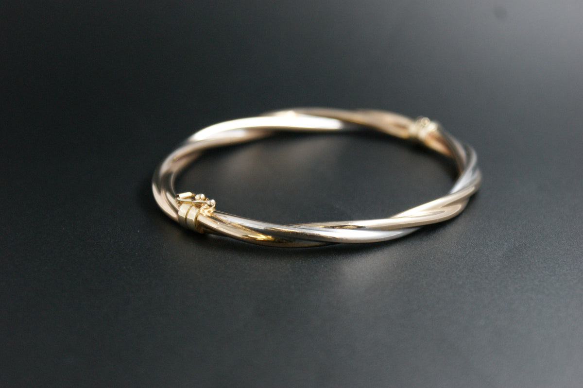0177-9ct Three-Tone Gold Twisted Crossover Bangle