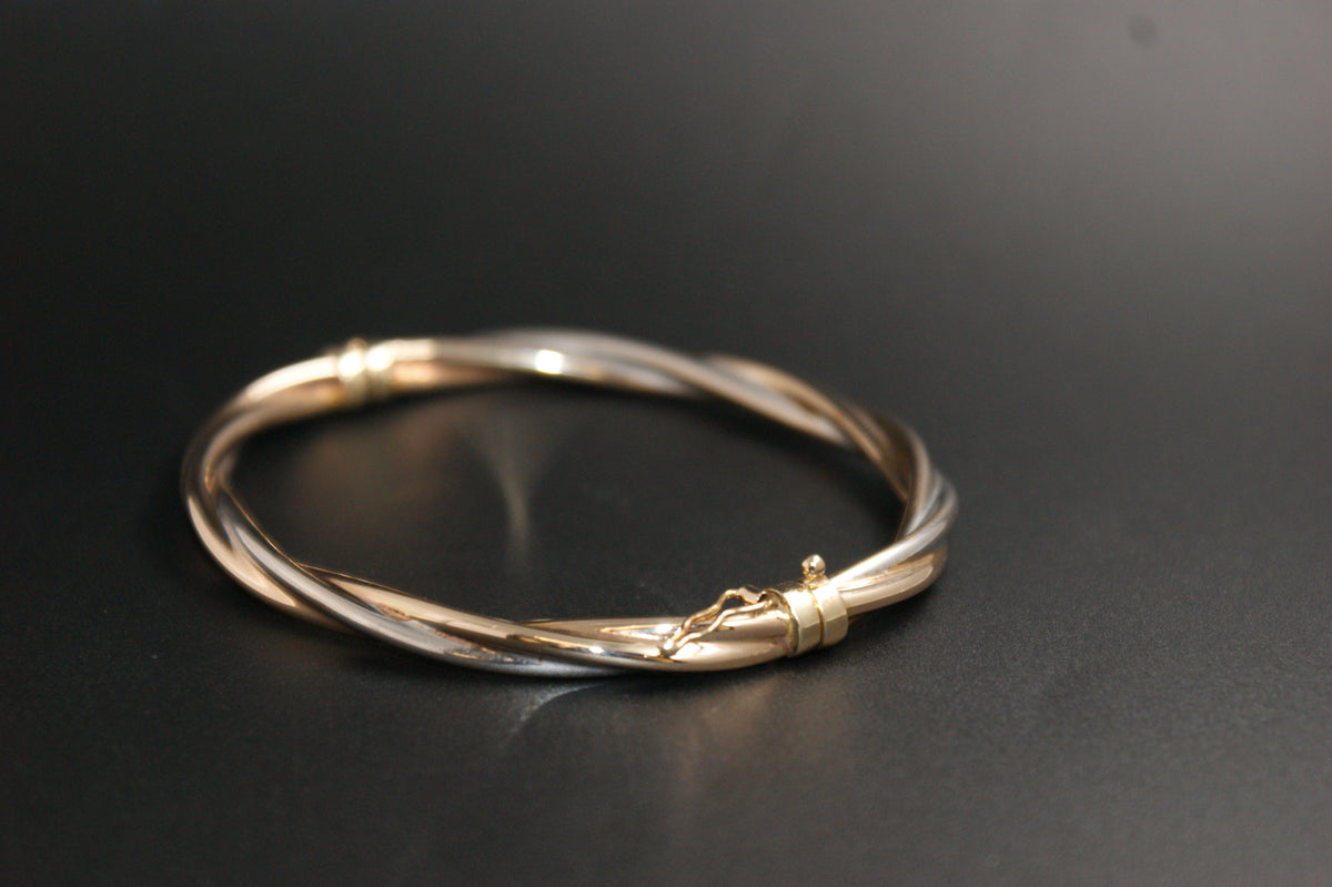 0177-9ct Three-Tone Gold Twisted Crossover Bangle