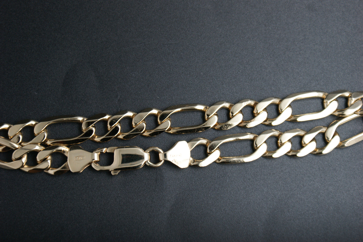 0187- 9ct Gold Figaro Bracelet.