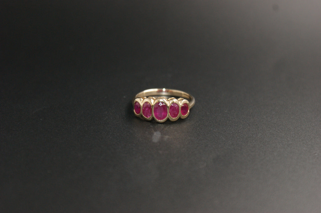 0203- 9ct Yellow Gold Five-Stone Ruby Ring