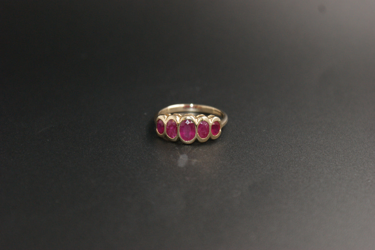 0203- 9ct Yellow Gold Five-Stone Ruby Ring