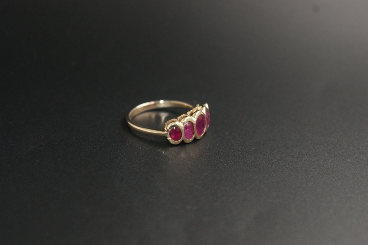 0203- 9ct Yellow Gold Five-Stone Ruby Ring