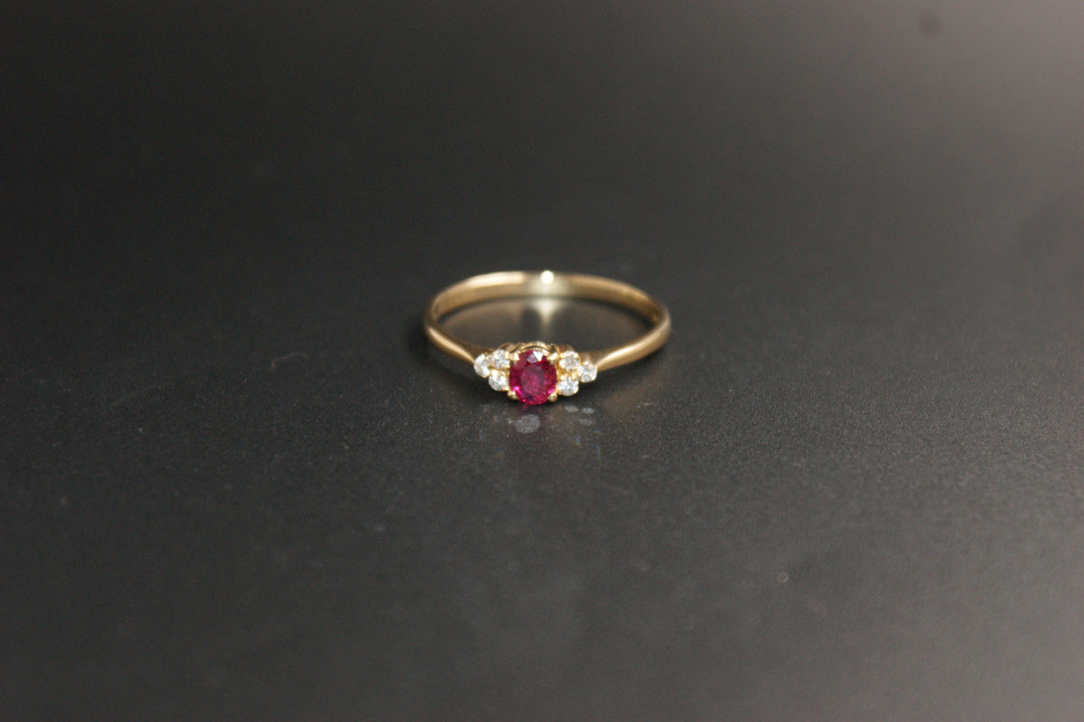 0206- 18ct Yellow Gold Oval Ruby and Diamond Ring