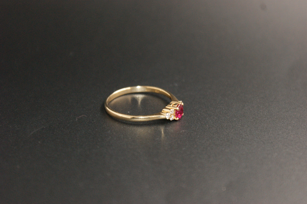 0206- 18ct Yellow Gold Oval Ruby and Diamond Ring