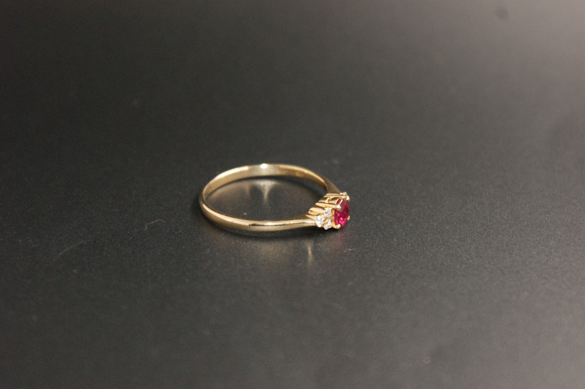 0206- 18ct Yellow Gold Oval Ruby and Diamond Ring