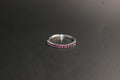0210- 9ct White Gold Ruby Half Eternity Ring.