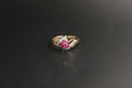 0213- 9ct Gold Ruby and Diamond Crossover Ring