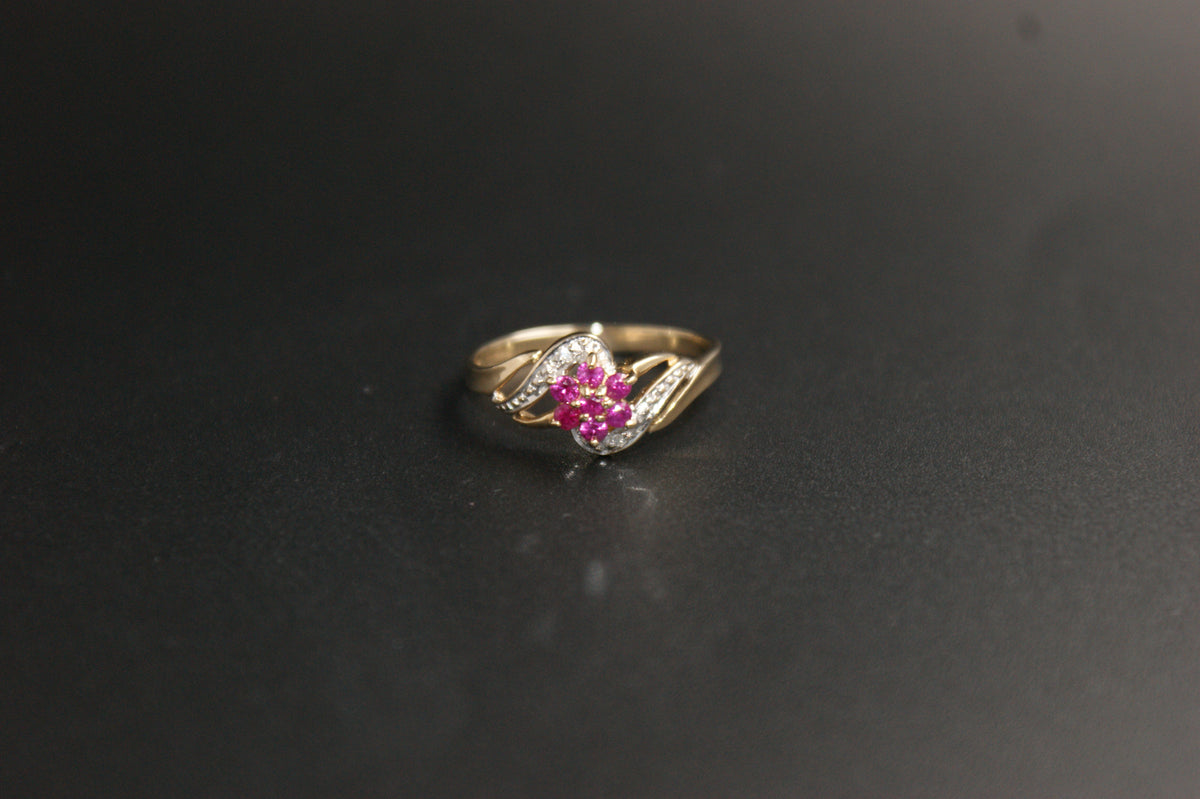 0213- 9ct Gold Ruby and Diamond Crossover Ring