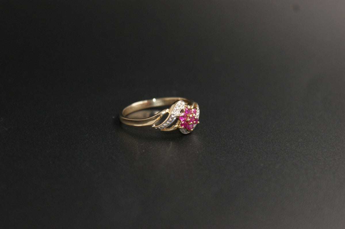 0213- 9ct Gold Ruby and Diamond Crossover Ring