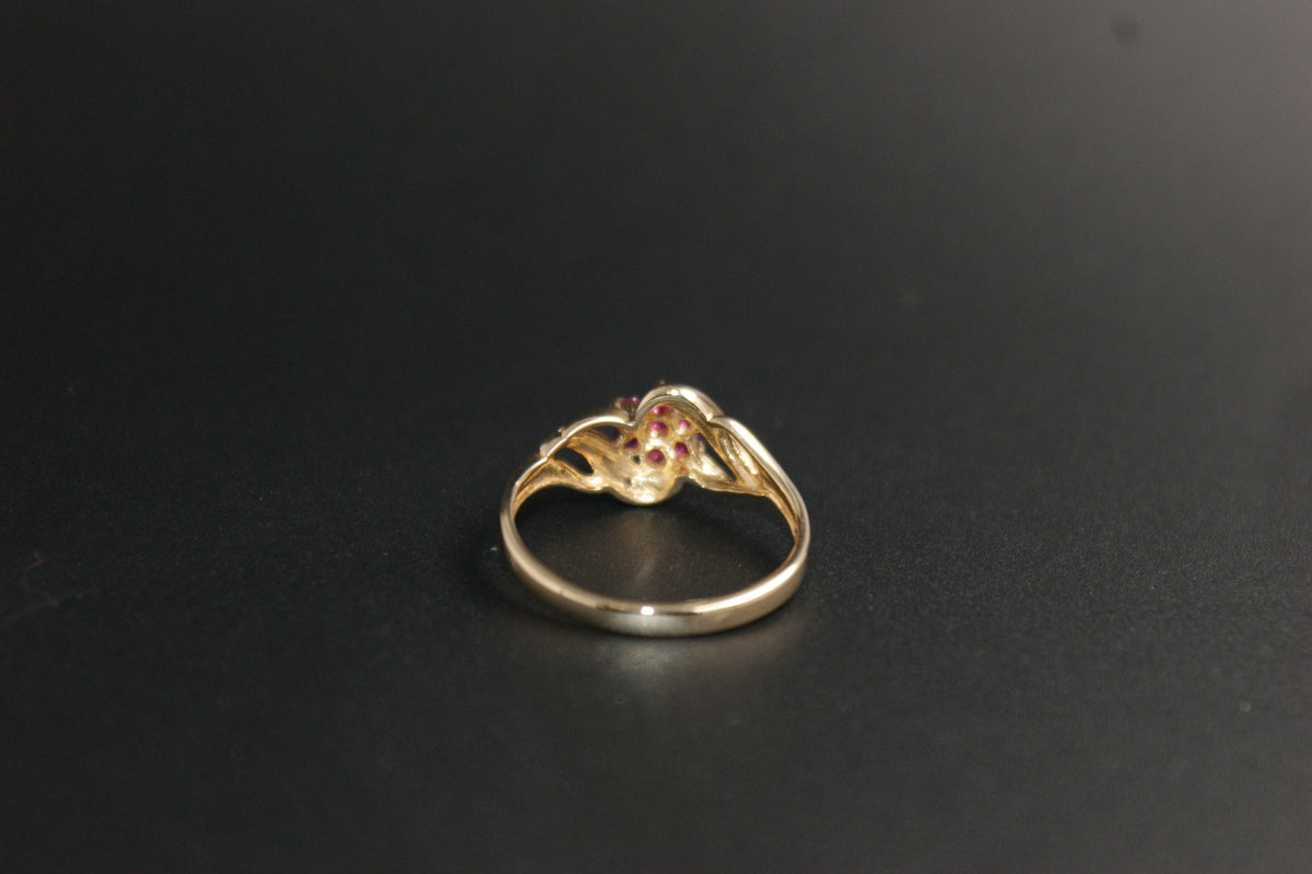 0213- 9ct Gold Ruby and Diamond Crossover Ring
